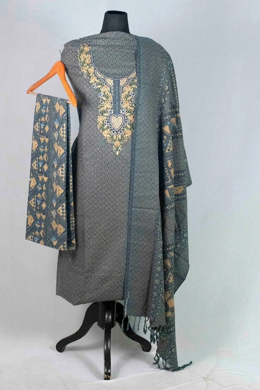 Blue Colour Woolen Kani Printed Suit With Neck And Over All Magical Print Provide Elegance.