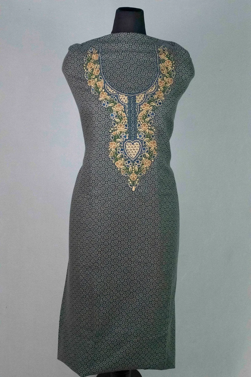 Blue Colour Woolen Kani Printed Suit With Neck And Over All Magical Print Provide Elegance.